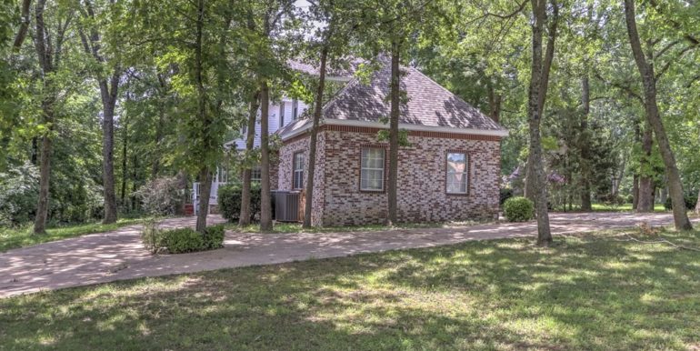 Owasso Real Estate for Sale | 18508 E 96th St N Owasso | Unique Properties | 004_Side of Home