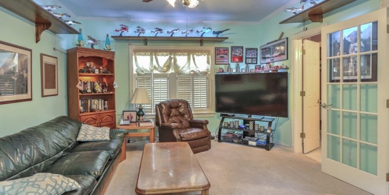 Owasso Real Estate for Sale | 18508 E 96th St N Owasso | Unique Properties | 014_OfficeTV Room