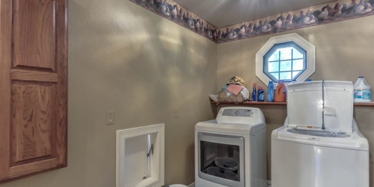 Owasso Real Estate for Sale | 18508 E 96th St N Owasso | Unique Properties | 030_Laundry Room