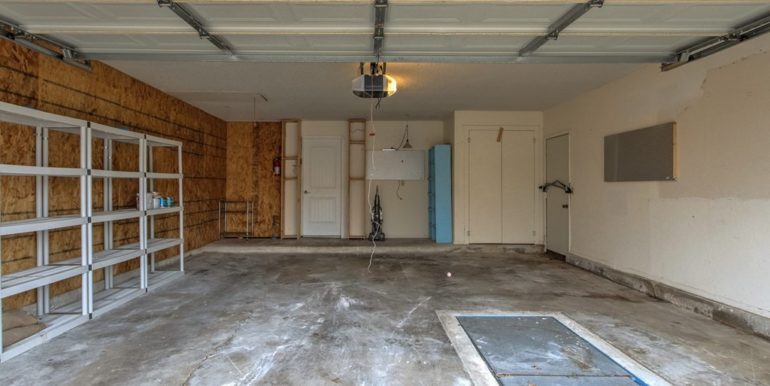 Tulsa Real Estate for Sale | 3444 S 148th East Pl | Unique Properties | 026_GarageStorm Shelter